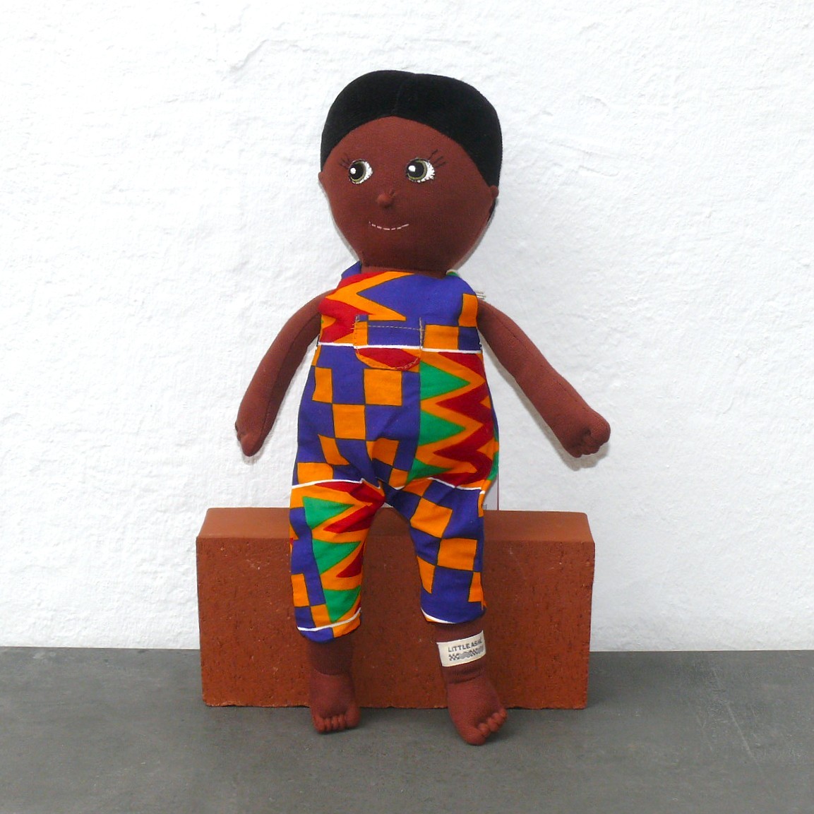  Artikelbild 1 des Artikels “Puppe Kwame “